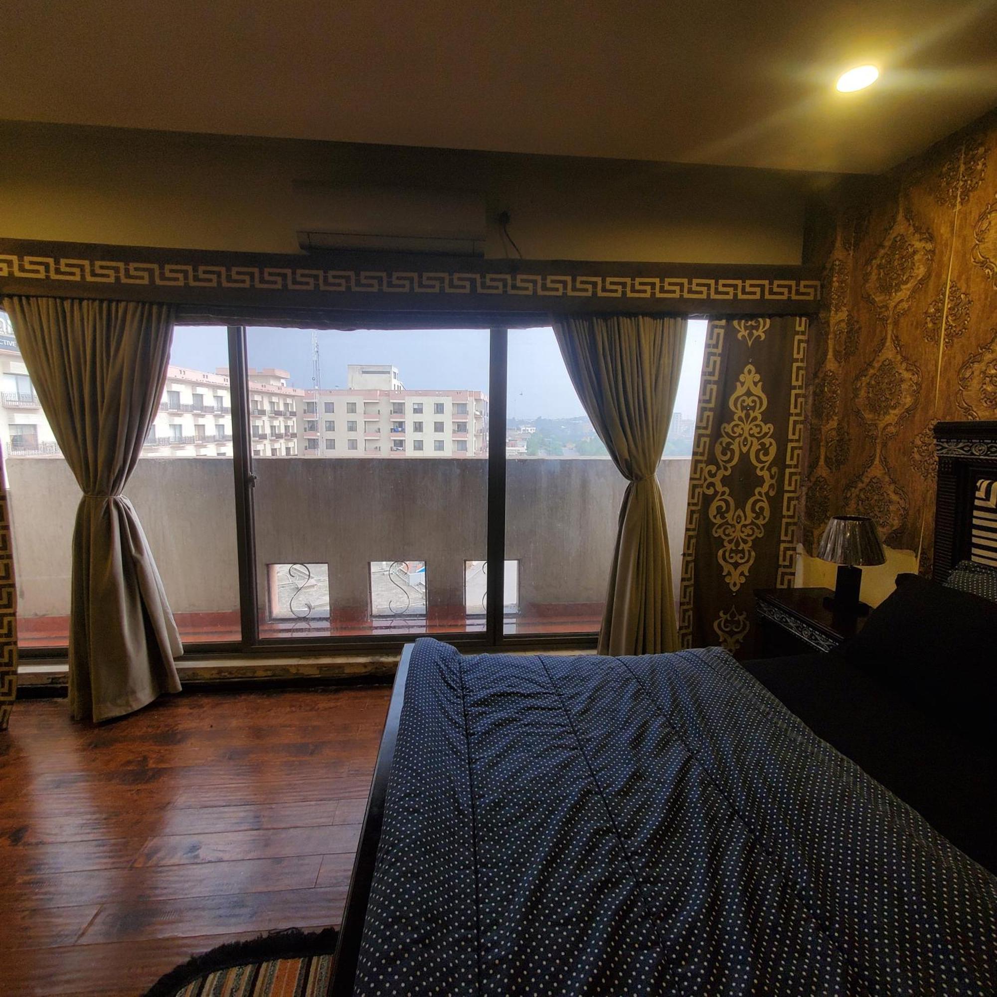 רוואלפינדי Cosmostay Islamabad, Bahria Town מראה חיצוני תמונה